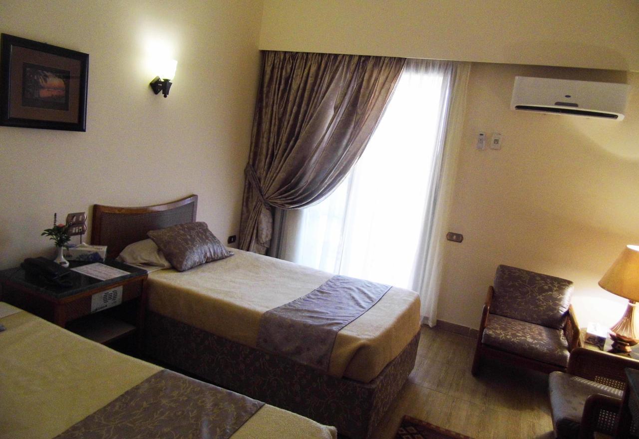 Mg Nefertiti Hotel 알 미니아 객실 사진