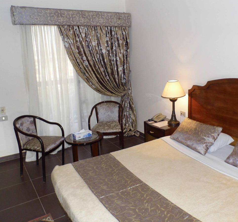 Mg Nefertiti Hotel 알 미니아 객실 사진